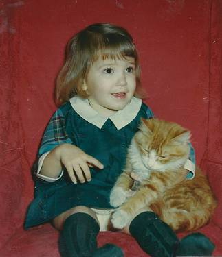 Michelle 3 years old with cat Aloysius